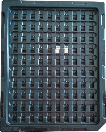 Black formed grid tray showing repeated cavities